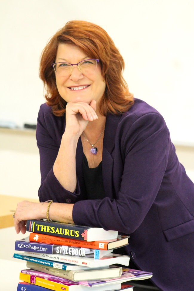 Professor Victoria with books